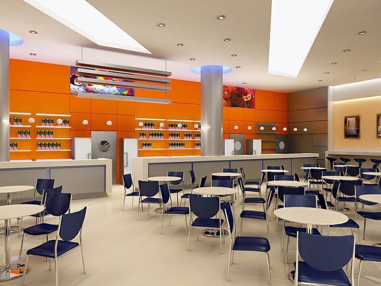 Интерьер кафе с оранжевыми стенами в офисном центре