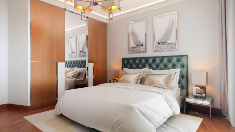 Темно-зеленая кровать в светлом интерьере спальни