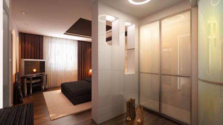 Зонированная часть спальни с белым платяным шкафом