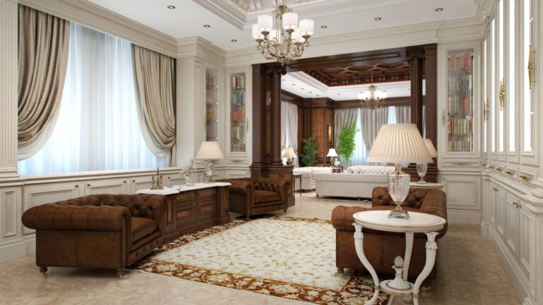 Светлая библиотека с мягкой кожаной мебелью коричневого оттенка