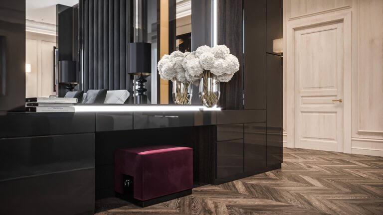 Темная спальня с красным бархатным пуфом