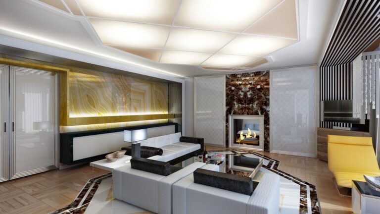 Интерьер светло-серой гостиной с золотистыми акцентами