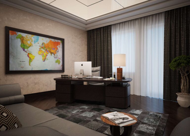 Карта мира в темной раме в интерьере кабинета