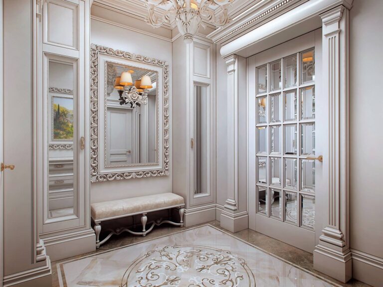 Небольшой холл с настенным зеркалом, оборудованным двойным бра