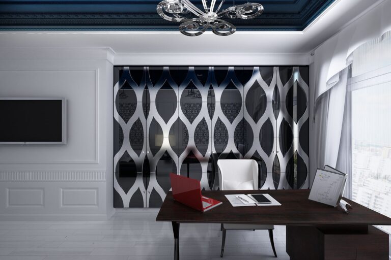 Черный книжный шкаф с серебристыми накладками в дизайне кабинета