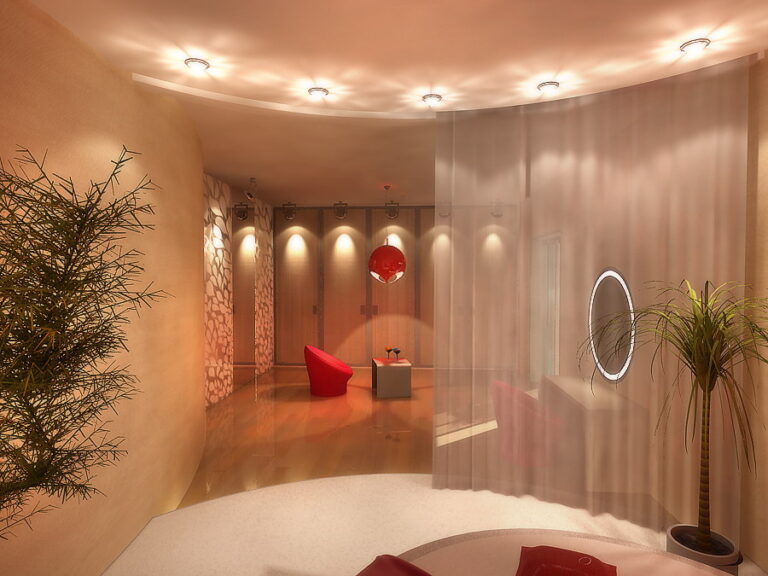 Дизайн просторной спальни с круглой красной люстрой