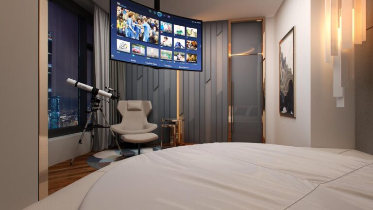 Спальня с подвесным телевизором над кроватью