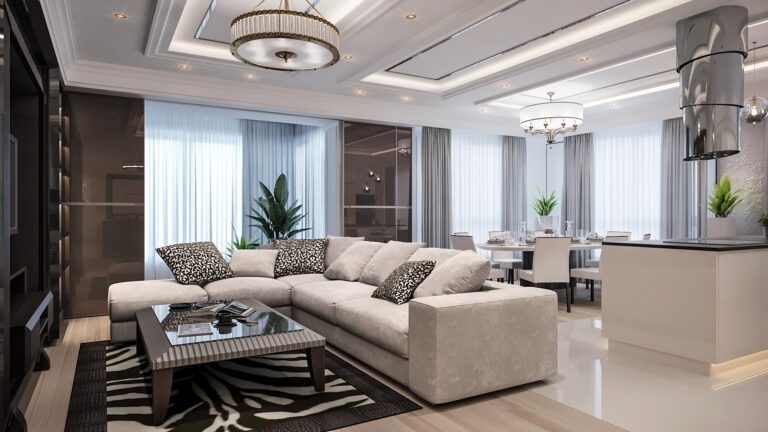 Зона отдыха с угловым модульным диваном в серой обивке