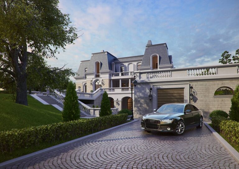 Зона парковки из серой гранитной  плитки и гараж из камня