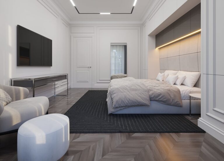 Интерьер светлой спальни с большой консолью в зоне ТВ