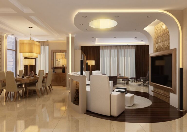 Белая мебель в зоне отдыха с темным полом в оформлении гостиной