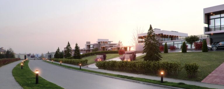 Дизайн участка перед передним фасадом загородного дома белого цвета