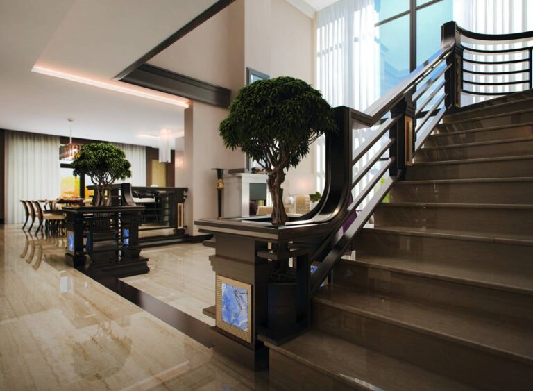 Роскошный дизайн холла с широкой светлой лестницей