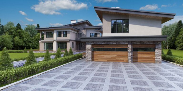 Гаражи в фасадной части с площадкой для парковки из серого камня