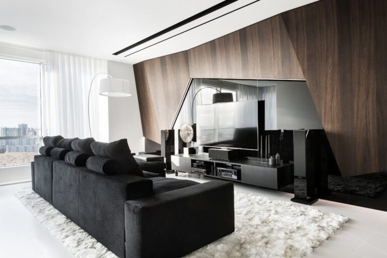 Объемная фигурная стеновая панель в дизайне гостиной