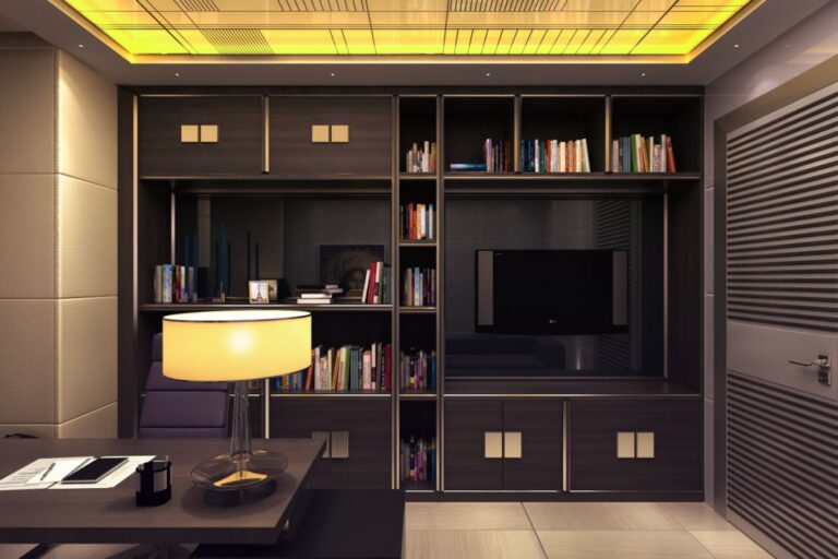 Удобный шкаф для книг с местом для размещения телевизора в дизайне кабинета